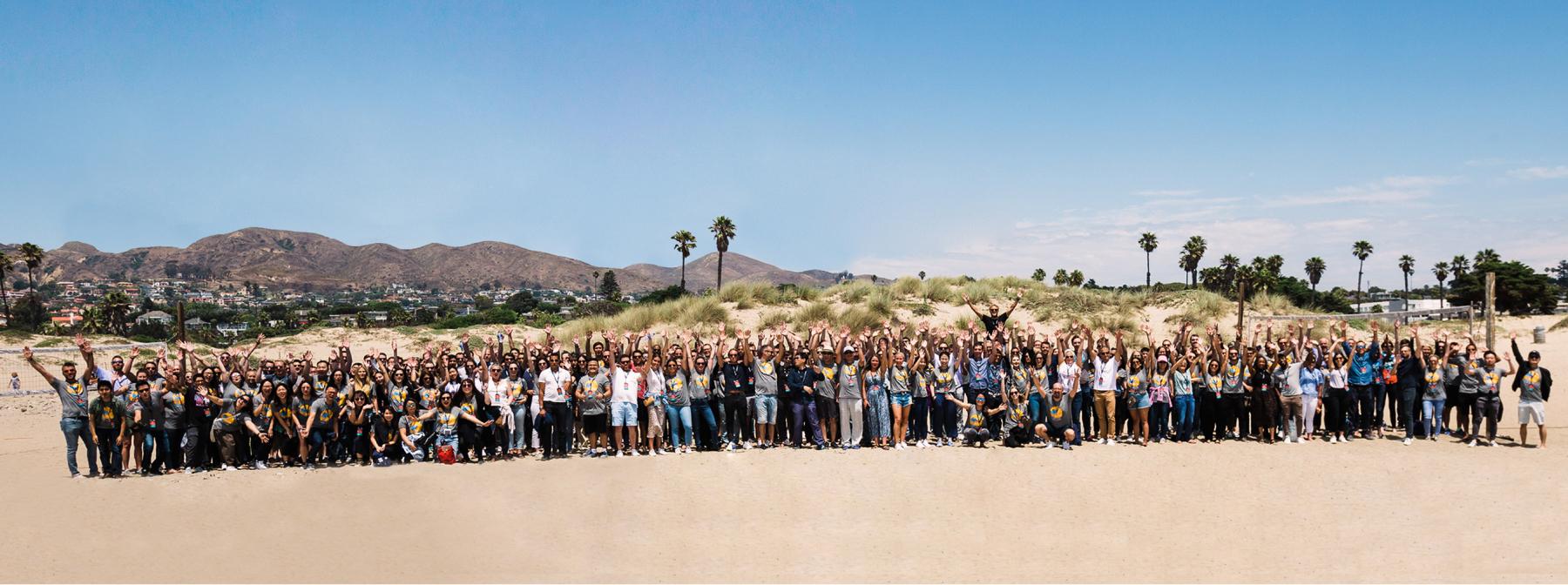 Photo of The Trade Desk coworkers on a beach